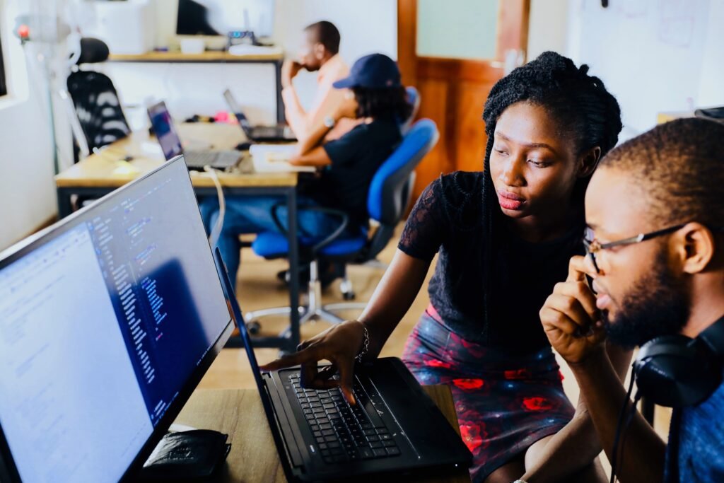 Woman and Man browsing computers